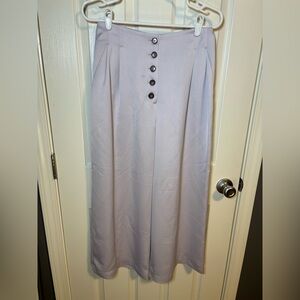 Women’s Topshop lilac trousers with button detail. NWTSize: 6